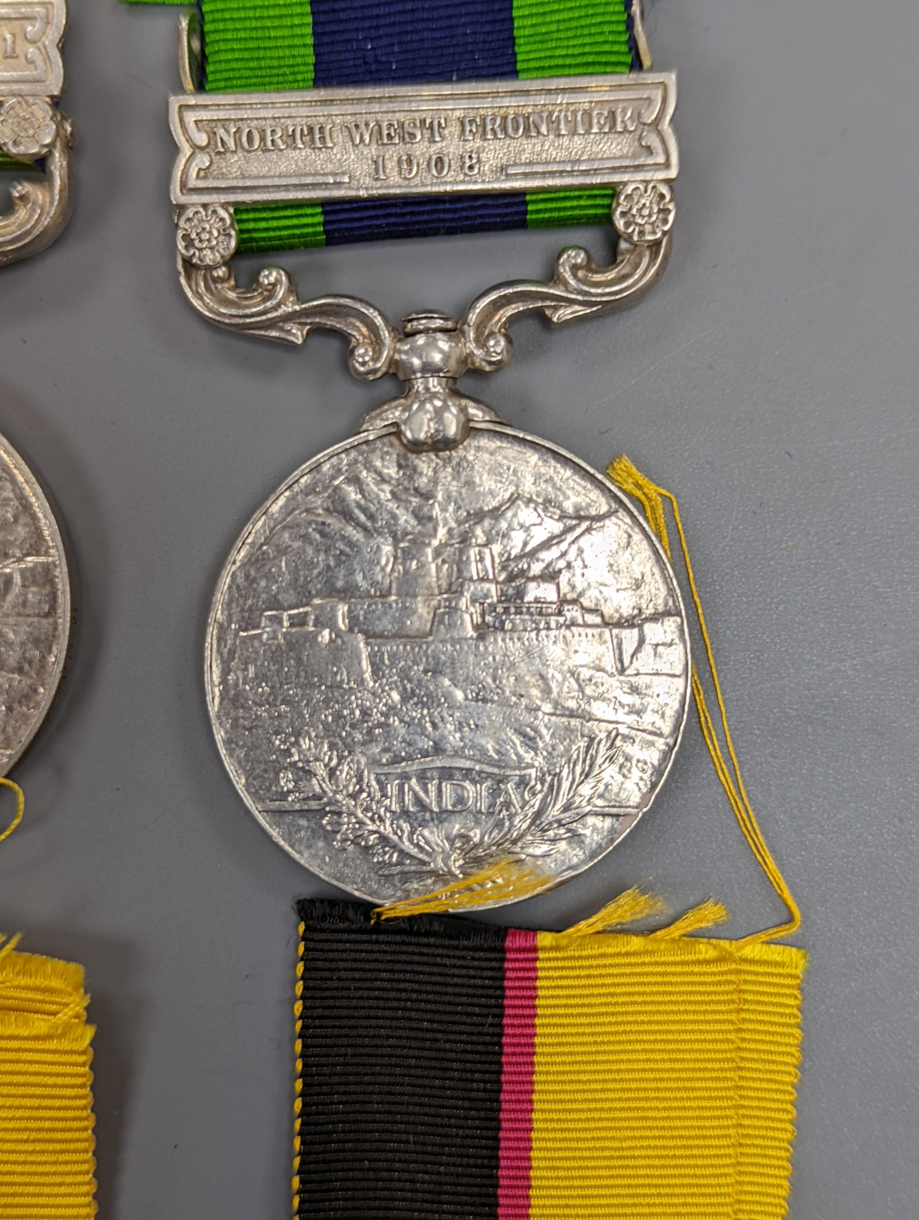 An Edward VII India GSM with North West Frontier 1908 clasp to 678 PTE. G. BAGNELL I/RL WARWICK REGT., a George V India GSM with Waziristan 1919-21 clasp to MTCD-33318 PEON BHAGELLOO I.A.S.C. , a Victoria Sudan medal and